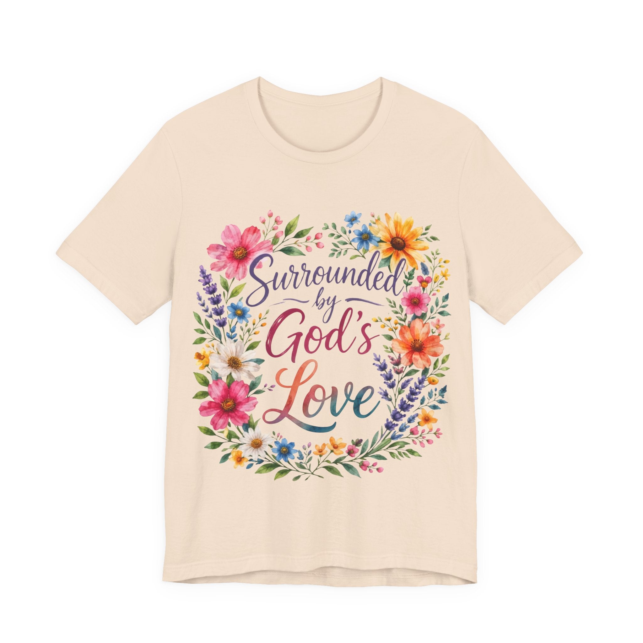 Soft Cream t-shirt with colorful floral design and text 'Surrounded by God's Love' on a white background