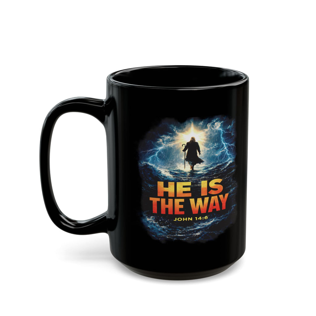Black mug with a religious design featuring a silhouette and text on a white background