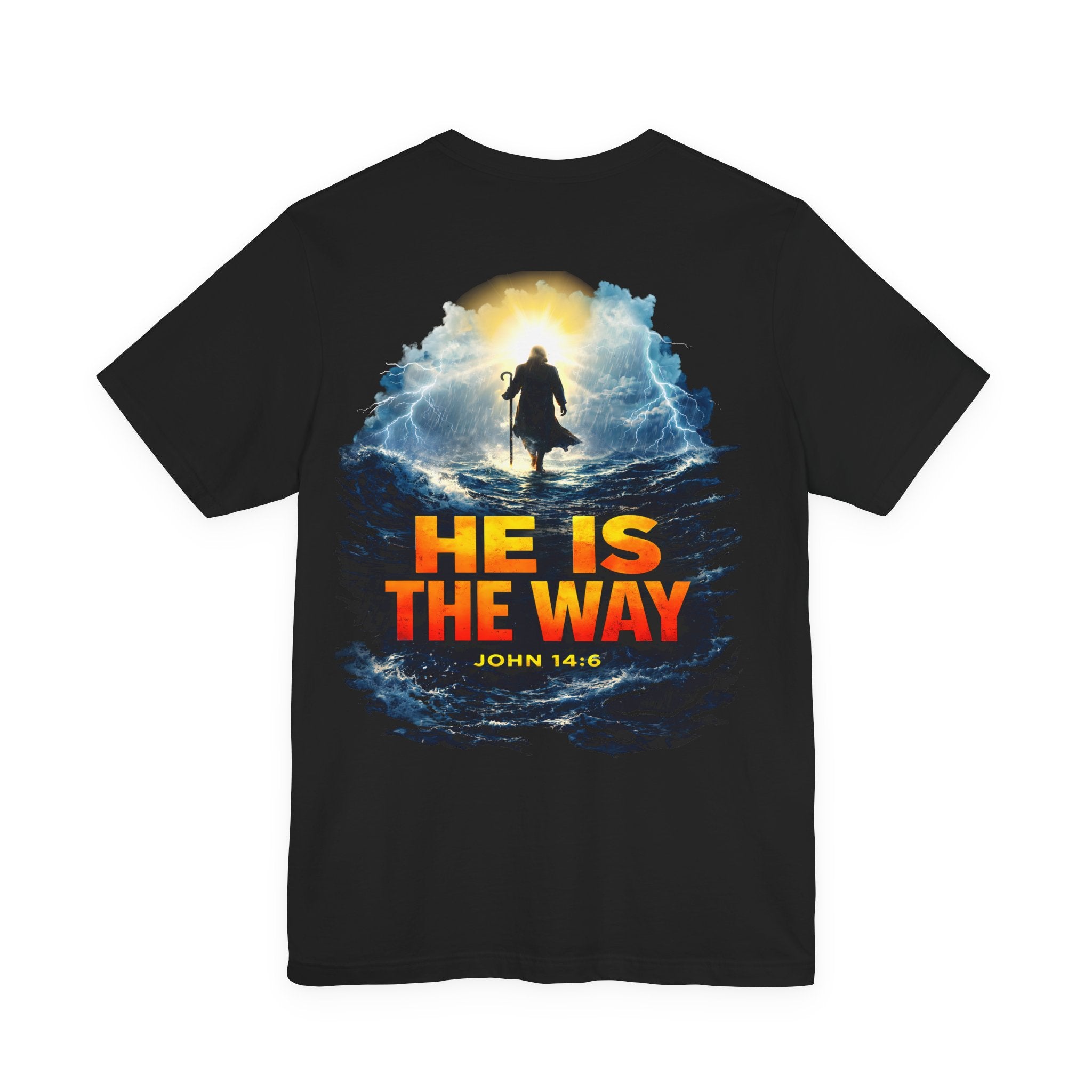Black t-shirt with a religious design featuring a figure walking on water and 'He is the Way' text.