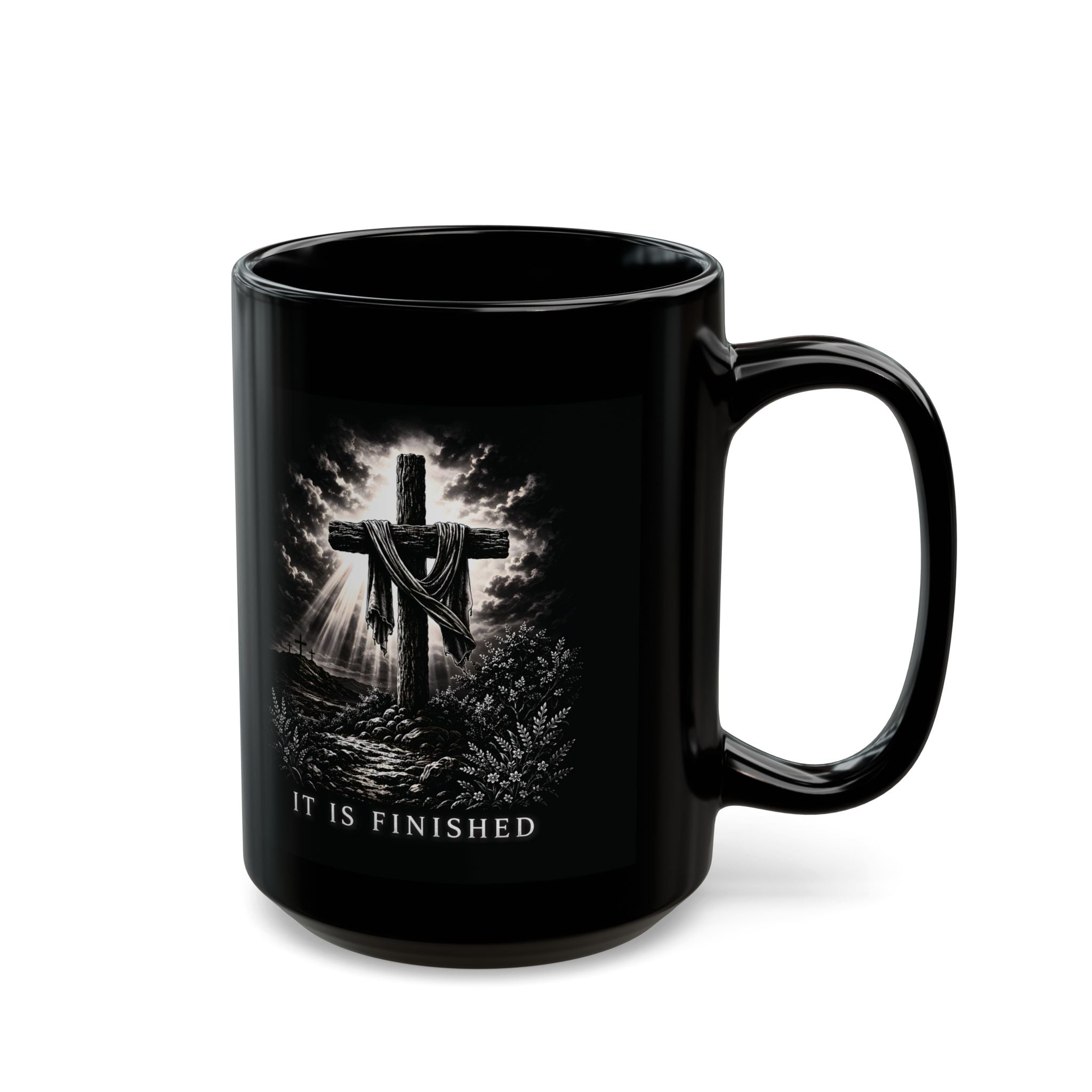 Black mug with a cross and 'It is Finished' text on a white background
