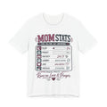 White t-shirt with 'Mom Stats' graphic design.