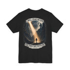 Black t-shirt with a graphic design and text on the back, displayed on a white background.