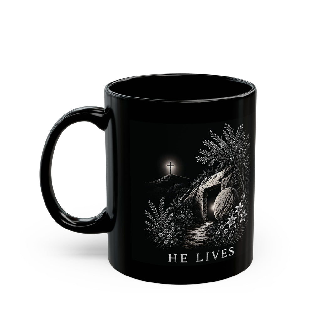 Black mug with a religious design featuring a cross and 'HE LIVES' text on a white background
