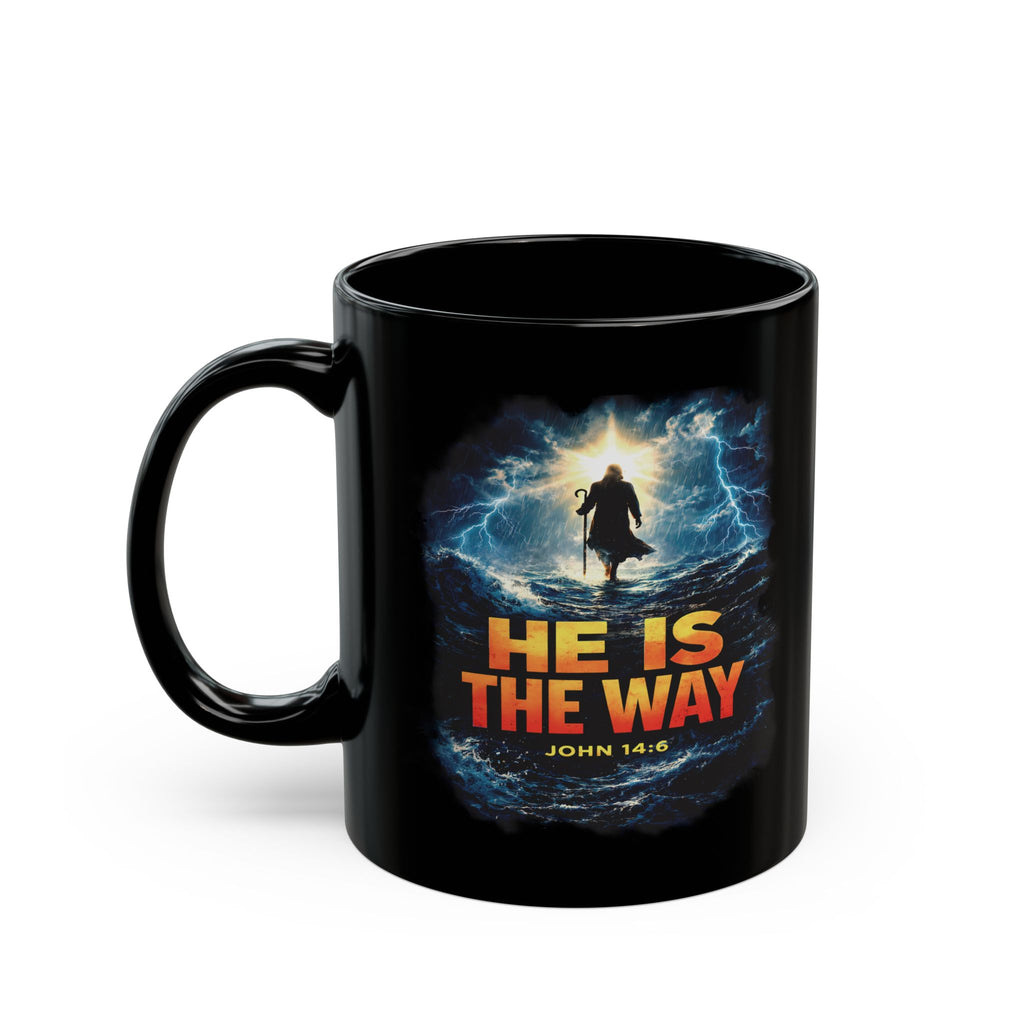 Black mug with a religious design featuring a silhouette of a person walking on water and text 'He is the Way'.
