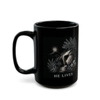 Black mug with white text on a white background